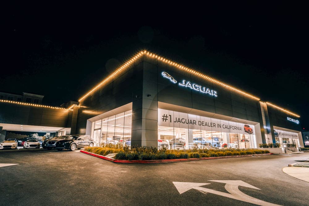 Layered holiday lighting and décor across a professionally planned commercial property